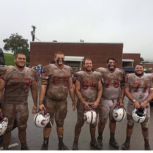 Left to right: Chase Courson, Rance Hightower, Connar Benson-Epstein, Austin Millsaps and Dalton Stephens stand side by side in their muddy uniforms following a 23-13 victory over Ferrum College. Photo Courtesy of facebook.com/maryvillecollegeathletics