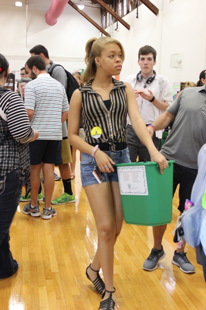 Students take advantage of the opportunity to rent out green recycle bins for their rooms from SGA. Photo Courtesy of Virginia Johnson.