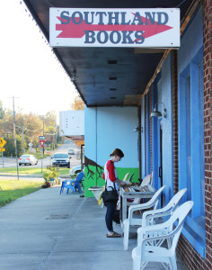 Claire Macmillan browses selection of bargain bin books outside the store. Photo courtesy of Peyton Jollay.