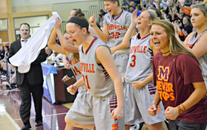 The Lady Scots’ bench gets fired up as their fourth quarter rally leads them to victory over Mary Washington. The win marked their first in NCAA tournament play, followed by a victory against Birmingham-Southern and a bid in the Sweet Sixteen. Photo by Beth Murphy.