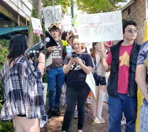 Advocates for ending rape culture gather together at Chattanooga’s 2015 Not Guilty March. Authorities at- tempted to deter the group from marching through the park, but they continued on, risking further resistance from police. Photo by Abi Burgess.