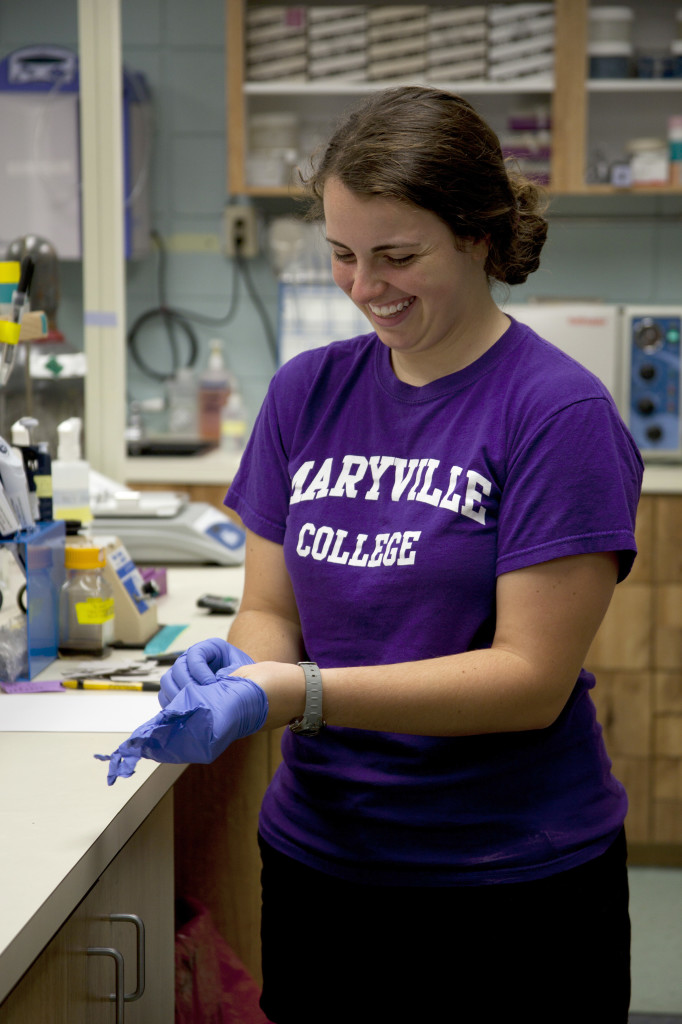 MC junior interns at biomedical research lab