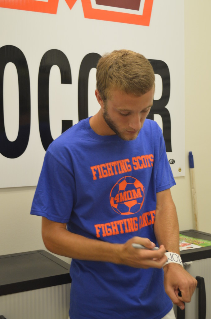 Soccer team sports light blue for colon cancer awareness, honors McCarty family