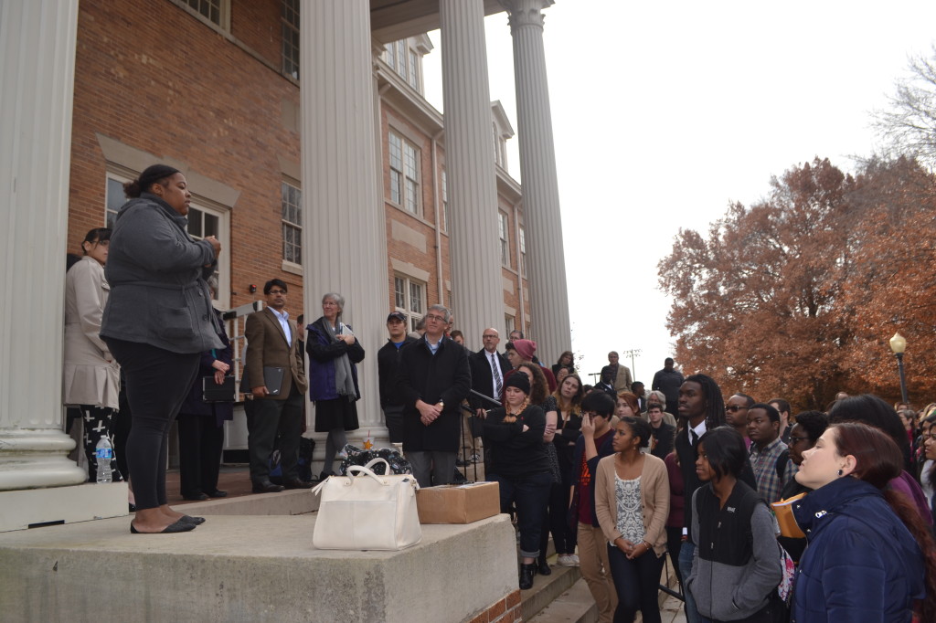 Students and others gather outside Thaw Hall on Thursday, Dec. 4 to observe Black Out Week. Photo Courtesy of Shelby Sparks.