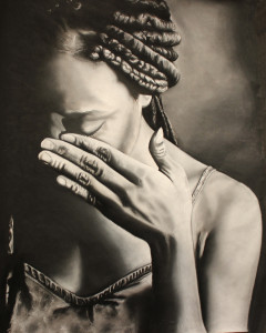This painting, entitled “Weeping Woman,” is rich in emotional detail, and shows the dark past that the “born free” generation has behind them. Photo by Candace Whitman.