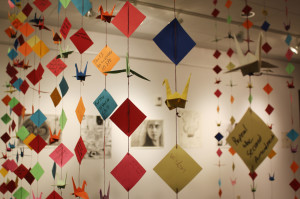 “A Thousand Cranes” was put on display during D’arte’s J- Term exhibition of student artwork. The piece brings unity to the entire MC community through paper cranes and the written wishes of students. Photo by Clair Scott.