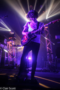 Jordan Lawler plays lead guitar and bass for popular French electronic band M83. Photo by Clair Scott.