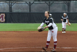 Morgan Corland, No. 2, winds up to pitch in the second inning. Photo by Kenneth Rawlings.